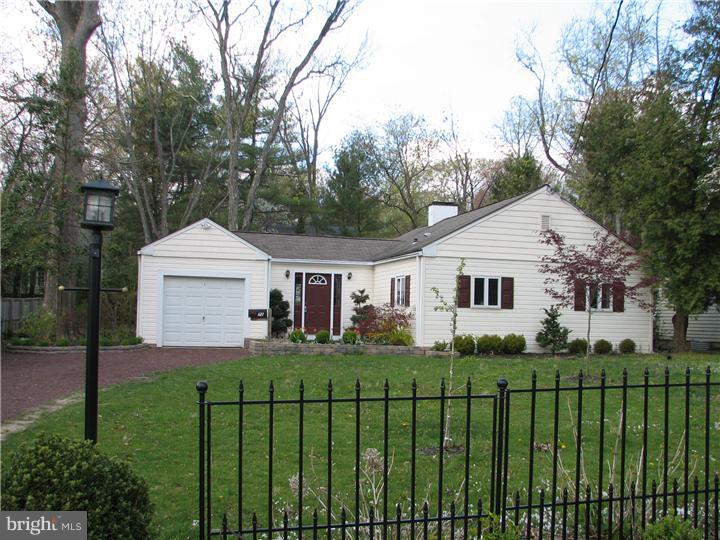70 Valley Road Princeton, NJ 08540 - Photo 1 of 22 a front view of a house with a yard and plants