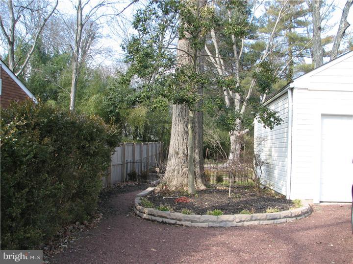 70 Valley Road Princeton, NJ 08540 - Photo 2 of 22 a view of a fire pit with large trees