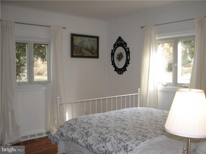 70 Valley Road Princeton, NJ 08540 - Photo 13 of 22 a bedroom with a bed and a window