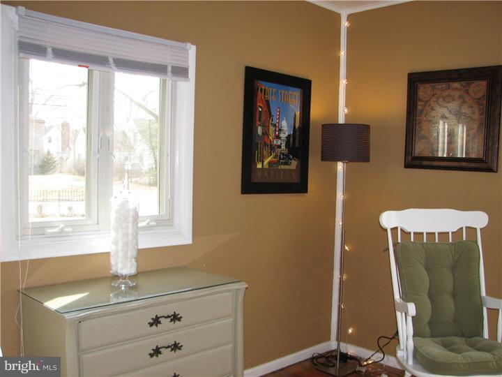 70 Valley Road Princeton, NJ 08540 - Photo 15 of 22 a bathroom with a window sink and mirror