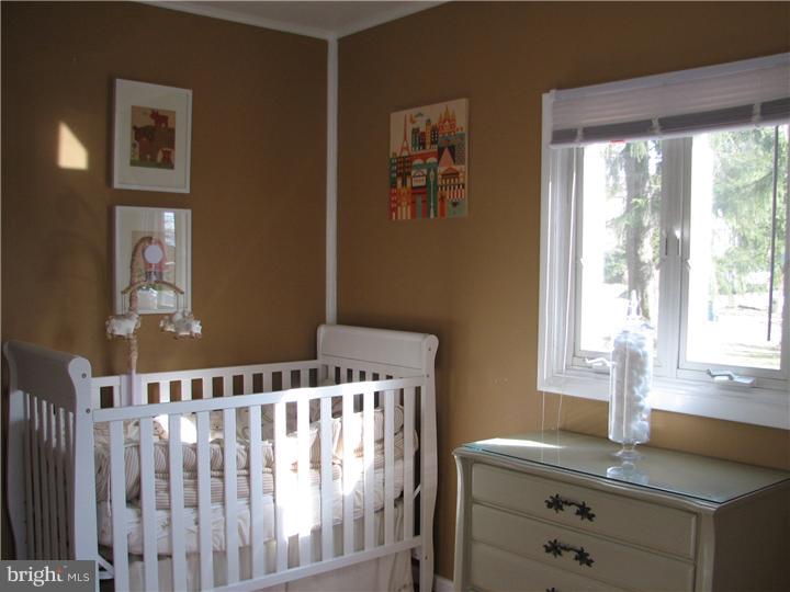70 Valley Road Princeton, NJ 08540 - Photo 16 of 22 a bedroom with a bed and a window