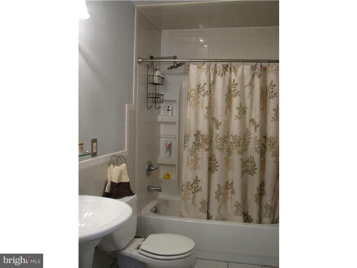 70 Valley Road Princeton, NJ 08540 - Photo 17 of 22 a bathroom with a toilet a sink and shower