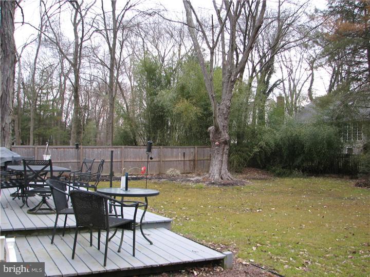 70 Valley Road Princeton, NJ 08540 - Photo 19 of 22 a backyard of a house with table and chairs