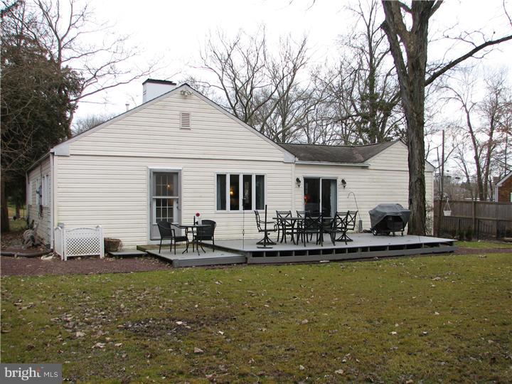 70 Valley Road Princeton, NJ 08540 - Photo 20 of 22 a front view of house with patio and garden