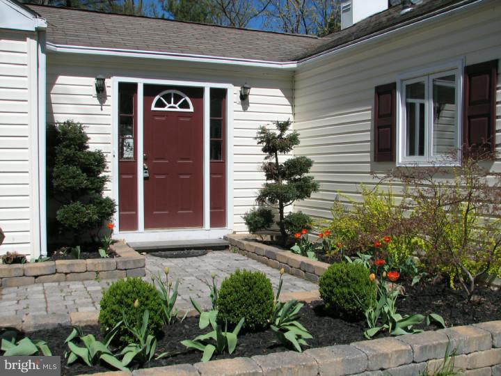 70 Valley Road Princeton, NJ 08540 - Photo 3 of 22 a front view of a house with a yard