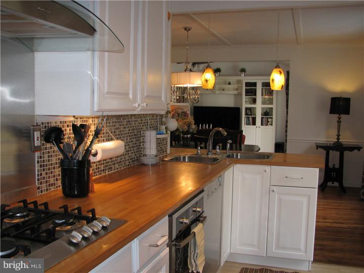 70 Valley Road Princeton, NJ 08540 - Photo 10 of 22 a kitchen with a sink and a stove top oven
