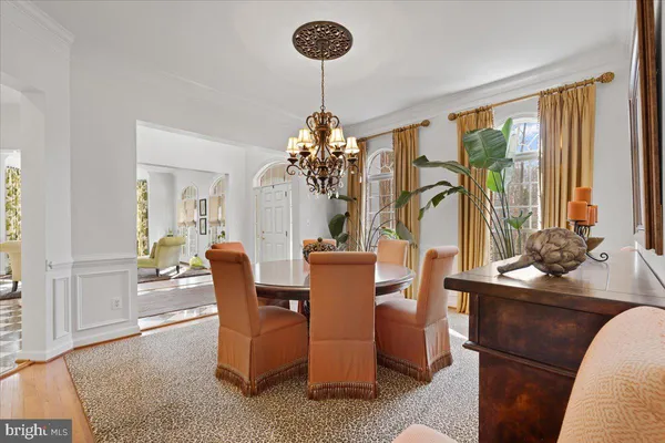 a kitchen with stainless steel appliances granite countertop white cabinets a sink and dishwasher