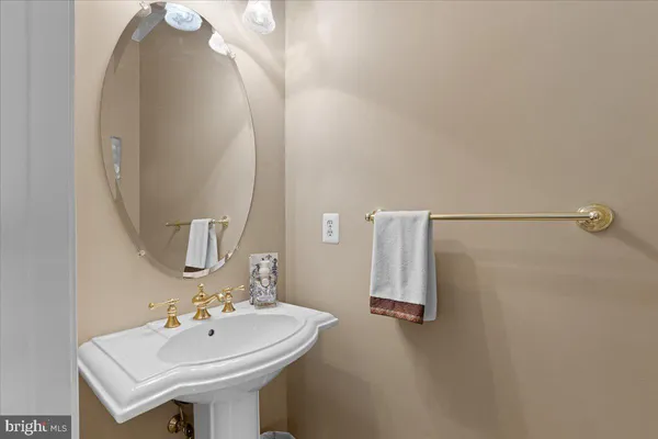 a spacious bedroom with a bed and a large window