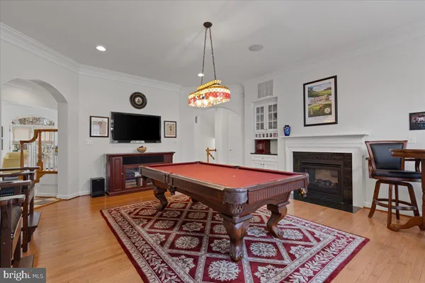 a bedroom with a large bed and a large window