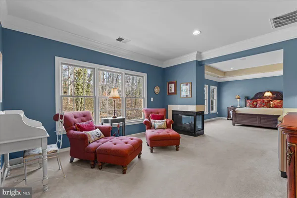 a bedroom with a bed and a lamp