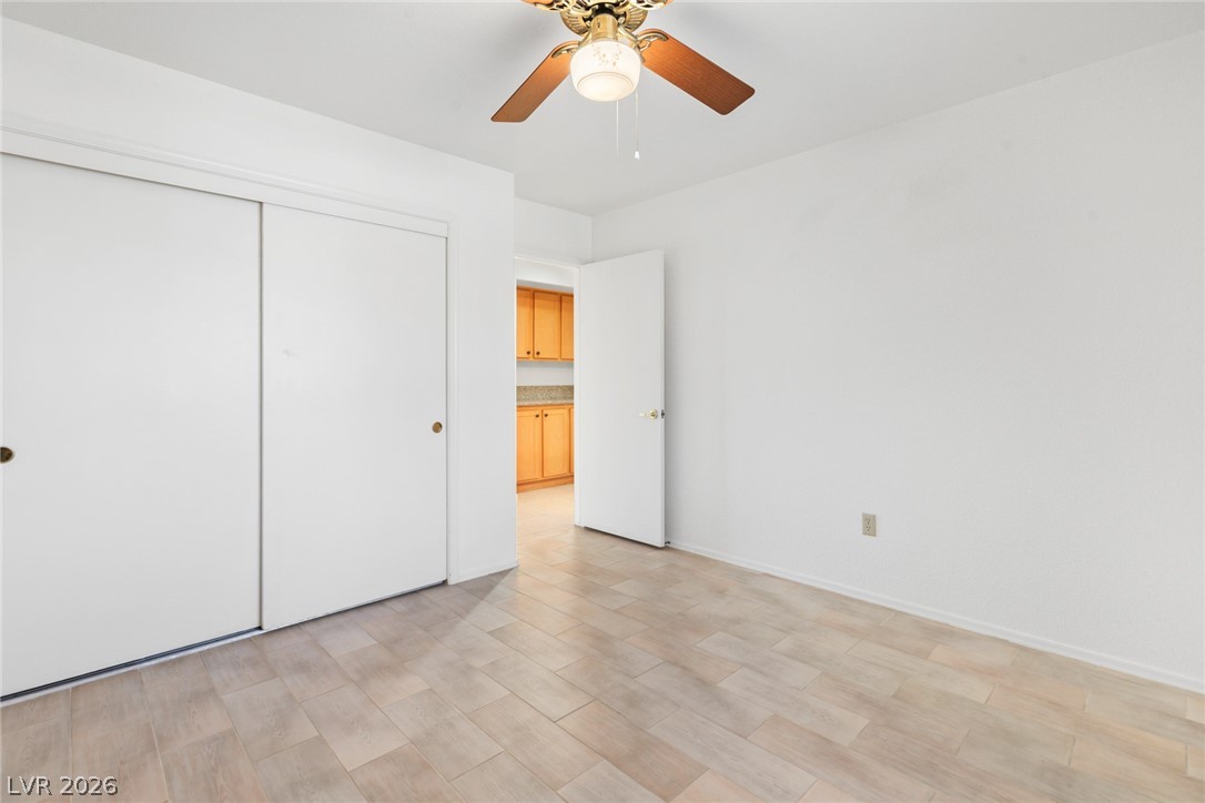 9433 Quail Ridge Drive Las Vegas, NV 89134 - Photo 23 of 25 This bright room features a spacious closet, durable flooring, and convenient access to an adjacent space.
