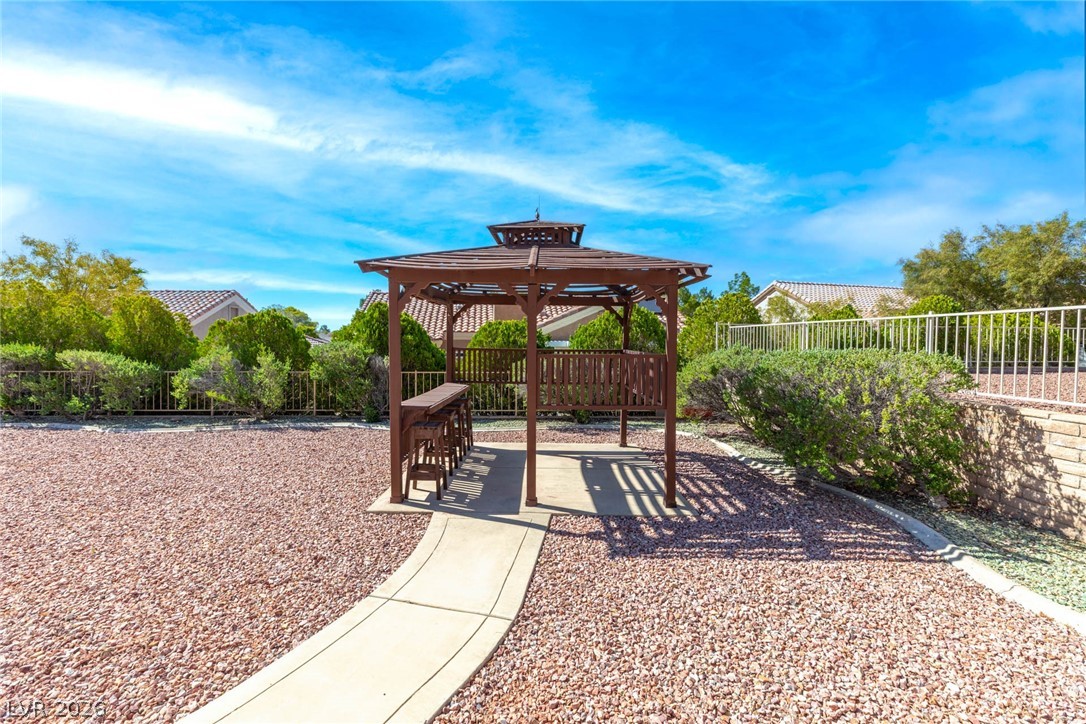 9433 Quail Ridge Drive Las Vegas, NV 89134 - Photo 5 of 25 Relax in this inviting gazebo, perfect for enjoying the outdoors in a peaceful setting.