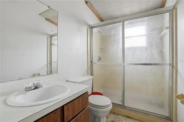 a view of a field with of trees