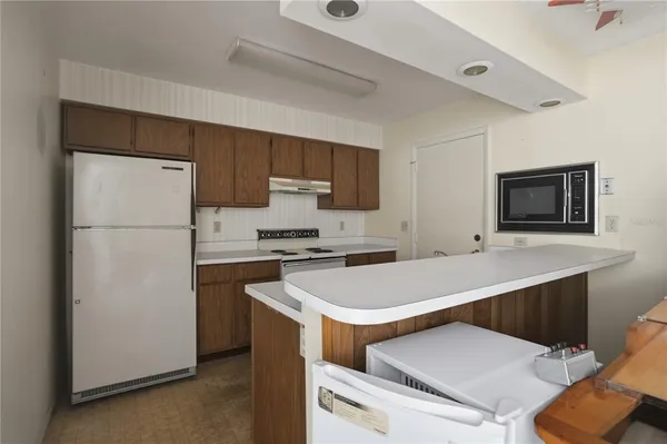 a view of a sink and a window