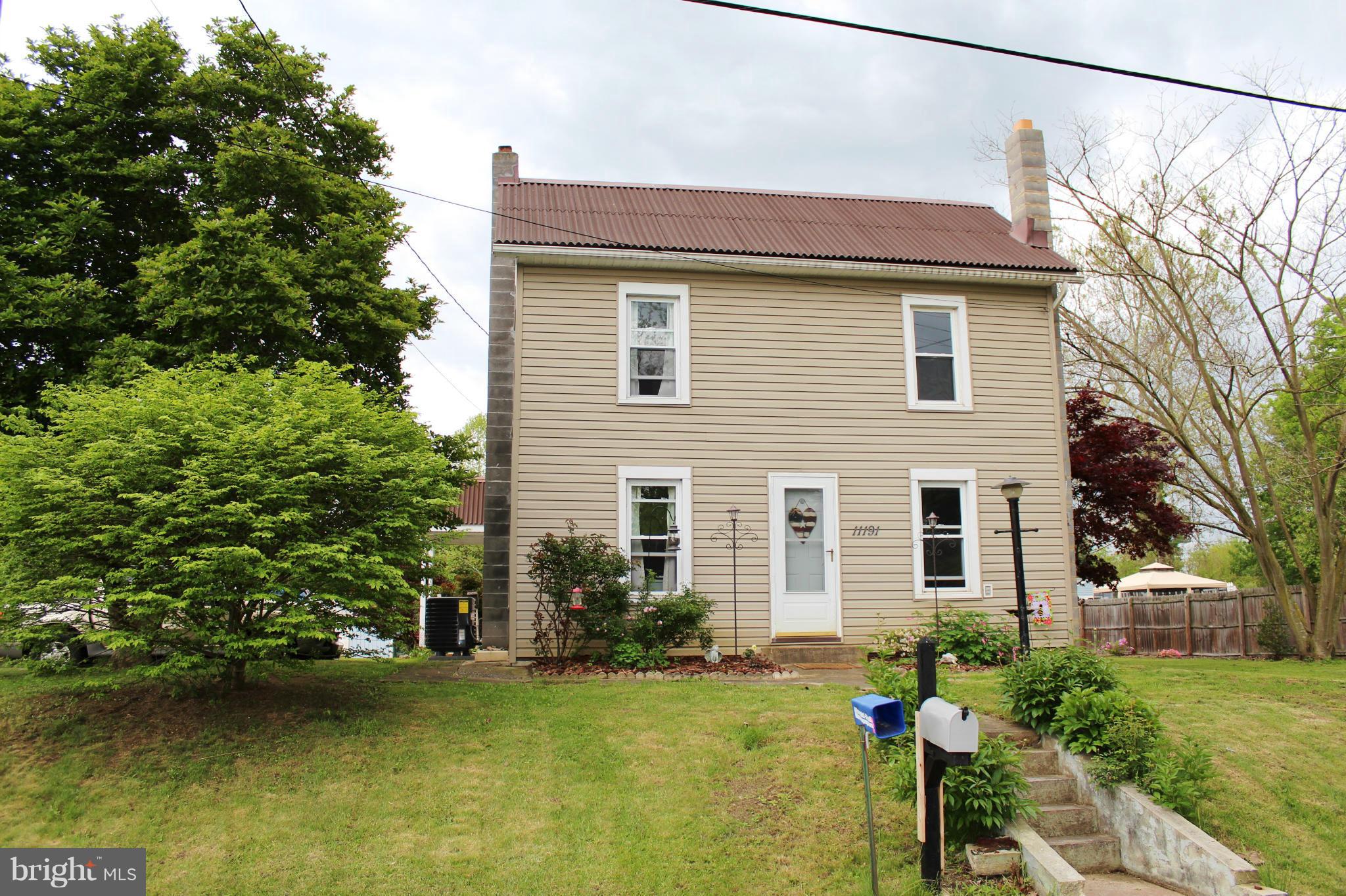 11191 Big Pool Road Big Pool, MD 21711 - Photo 1 of 30 front view of a house with a yard