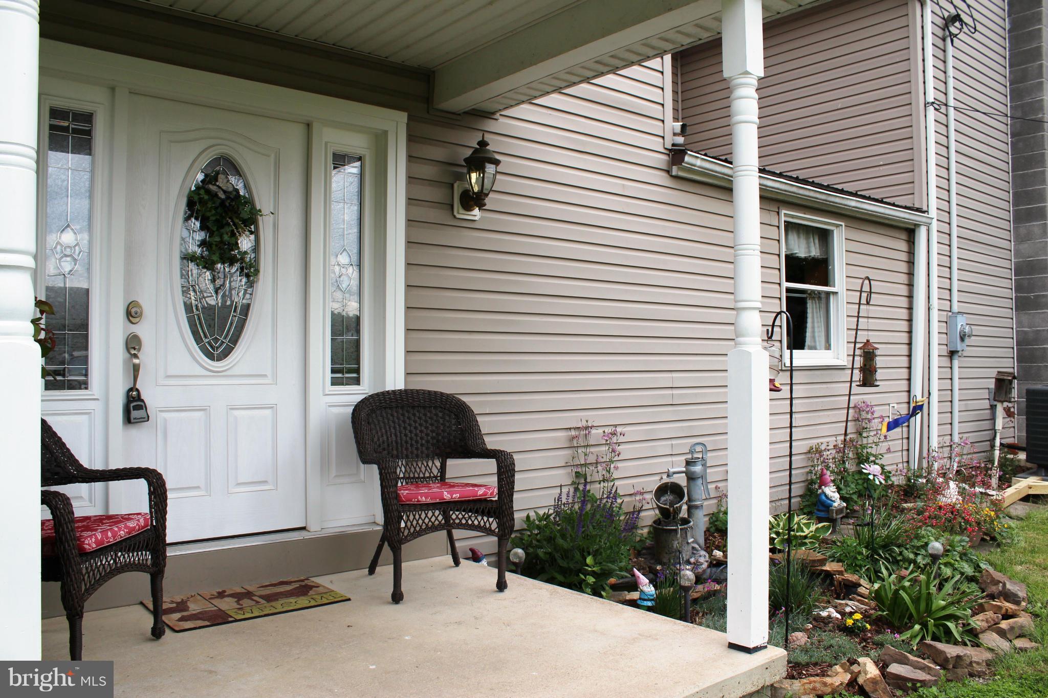 11191 Big Pool Road Big Pool, MD 21711 - Photo 2 of 30 a front view of a house with outdoor seating