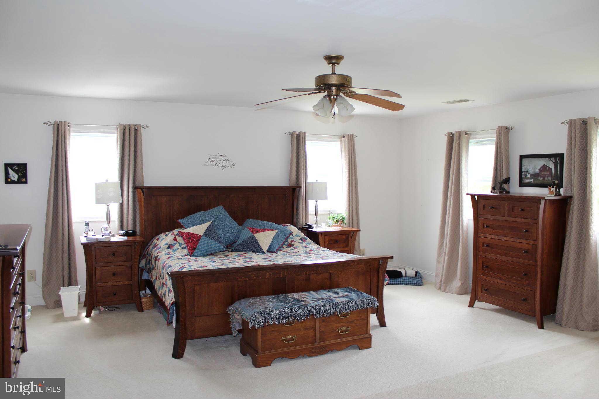 11191 Big Pool Road Big Pool, MD 21711 - Photo 19 of 30 a bedroom with a bed and dresser