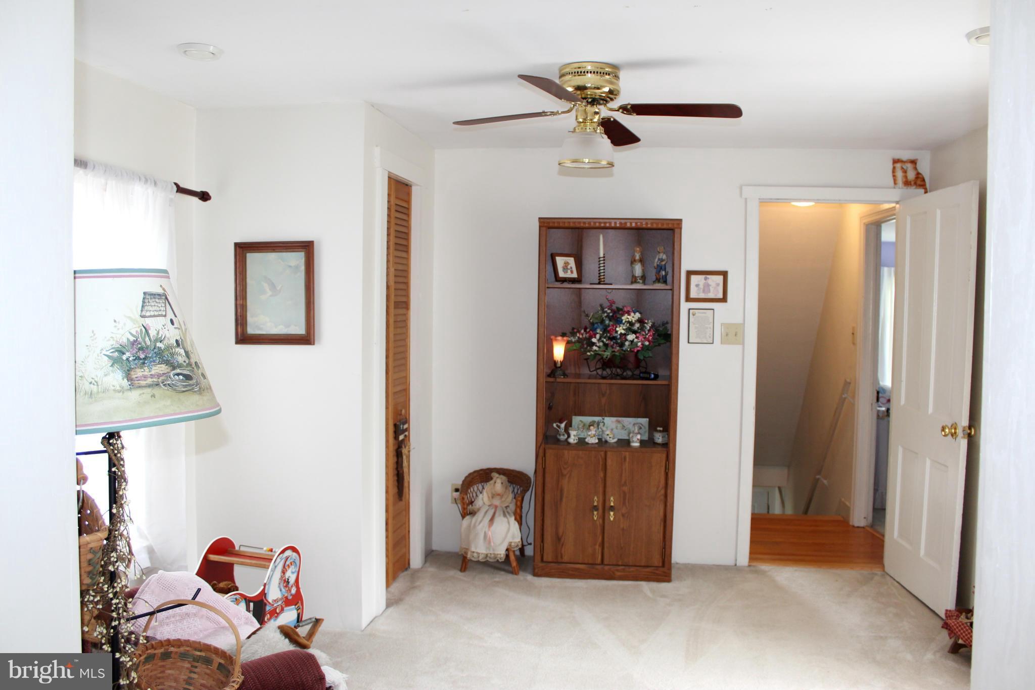 11191 Big Pool Road Big Pool, MD 21711 - Photo 20 of 30 a living room with furniture and a window