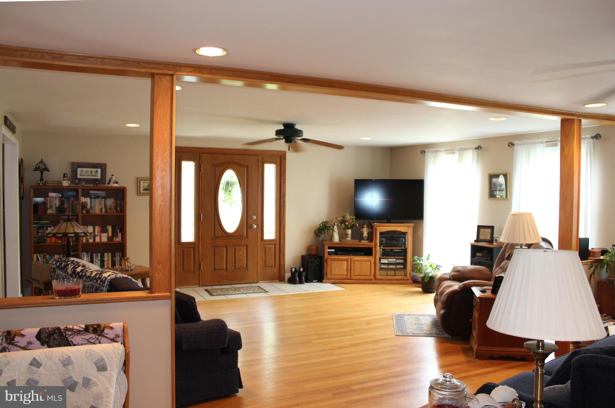 11191 Big Pool Road Big Pool, MD 21711 - Photo 6 of 30 a living room with furniture and a flat screen tv