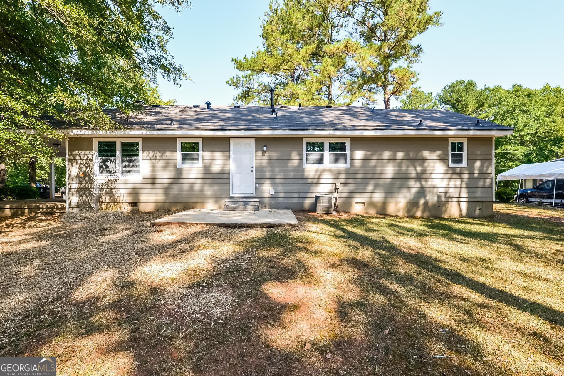 109 Landover Drive Stockbridge, GA 30281 - Photo 16 of 16 front view of a house with a yard