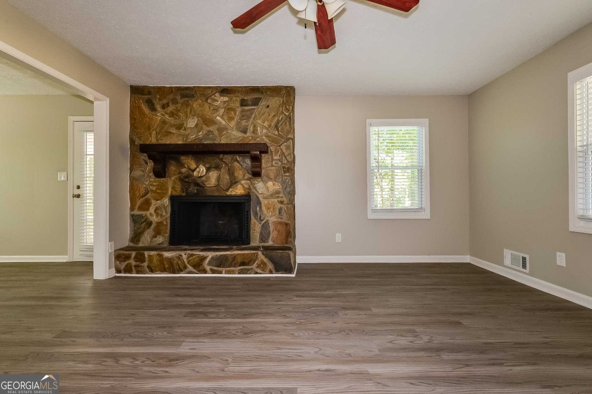 109 Landover Drive Stockbridge, GA 30281 - Photo 3 of 16 a view of fireplace and wooden floor