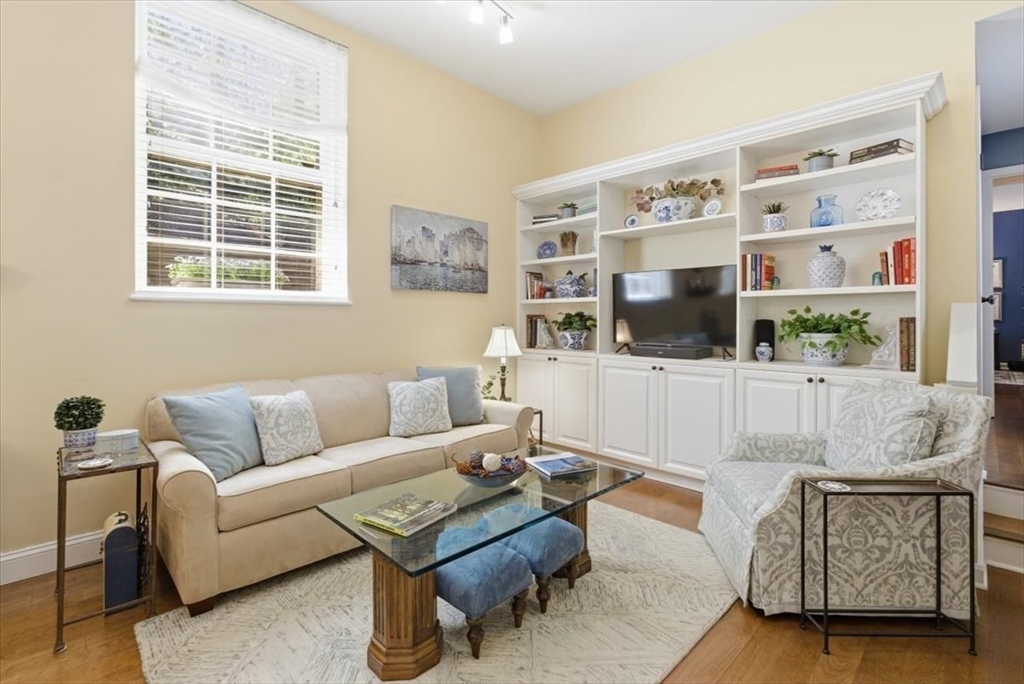 65 Glen Road, Unit H1 Brookline, MA 02445 - Photo 7 of 39 a living room with furniture and a window