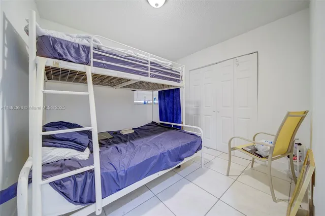 a kitchen with a sink and appliances