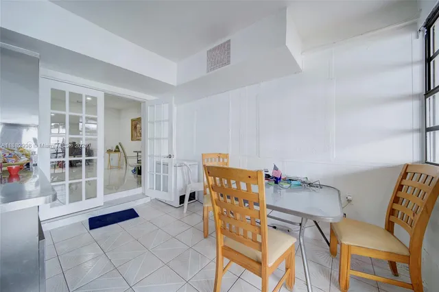 a view of a car in front of a house