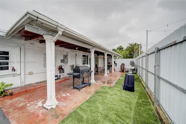 a view of kids room with toys and a window