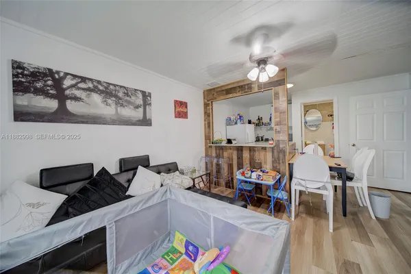 a bedroom with furniture and windows