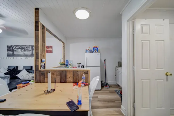 a bathroom with a sink a toilet and a shower