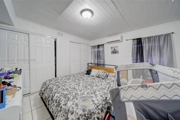 a kitchen with sink cabinets and appliances