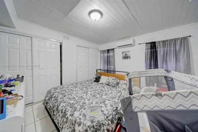 a kitchen with sink cabinets and appliances