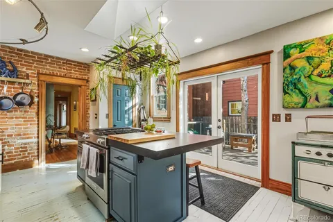 a workspace with furniture and a window