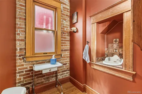 a bathroom with a toilet and shower