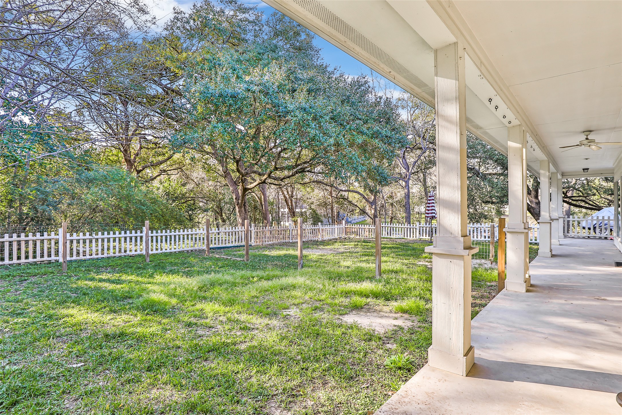 123 Burwell Road Highlands, TX 77562 - Photo 30 of 32 a view of a garden with a trees