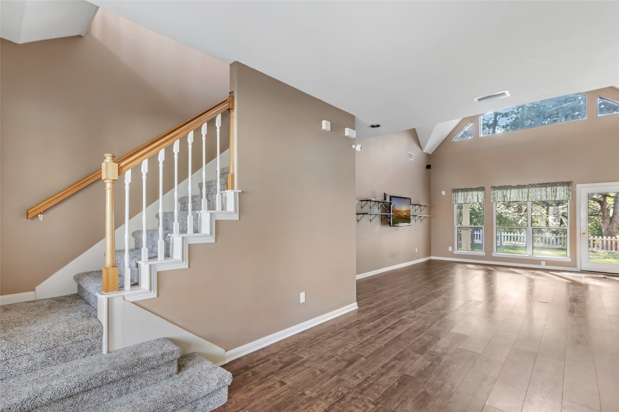123 Burwell Road Highlands, TX 77562 - Photo 5 of 32 a view of an entryway with wooden floor