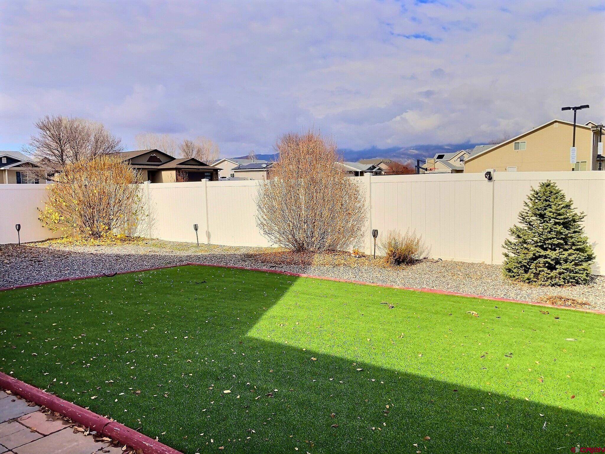 786 Dutton Street Delta, CO 81416 - Photo 17 of 29 completely fenced in back yard. dog tight and perfect for your privacy