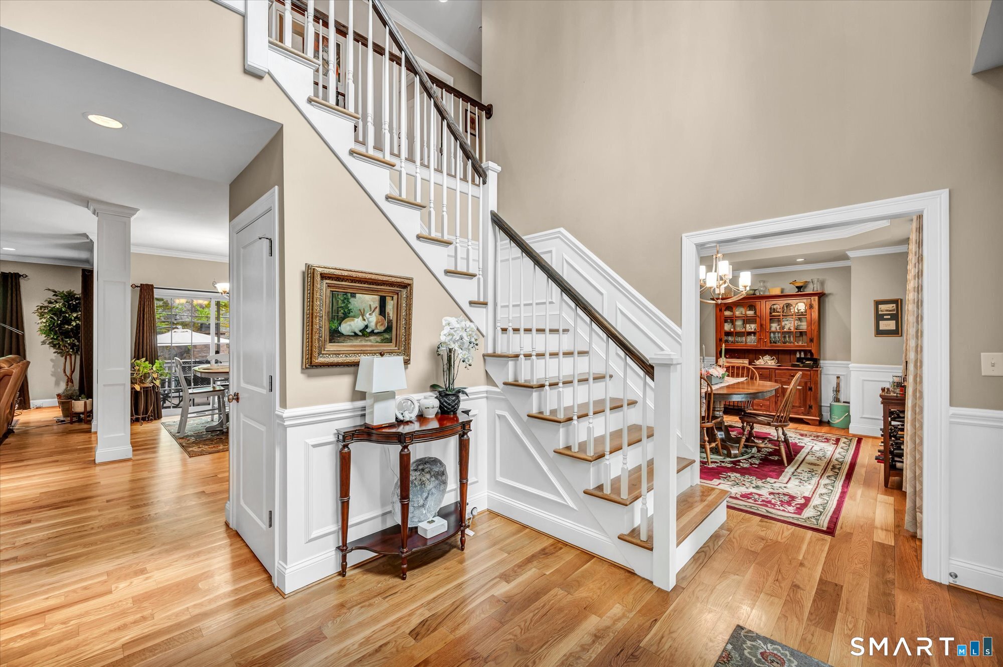 16 Sweetheart Mountain Road Canton, CT 06019 - Photo 5 of 40 a view of entryway dining room and hall with wooden floor