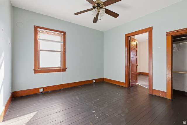 869 West Center Street Provo, UT 84601 - Photo 16 of 32 Unfurnished bedroom featuring dark wood finished floors and ceiling fan