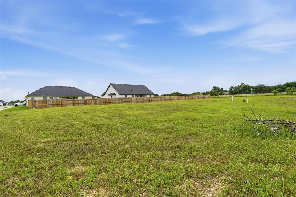 585 Highview Court Godley, TX 76044 - Photo 1 of 15 a view of an ocean from a building
