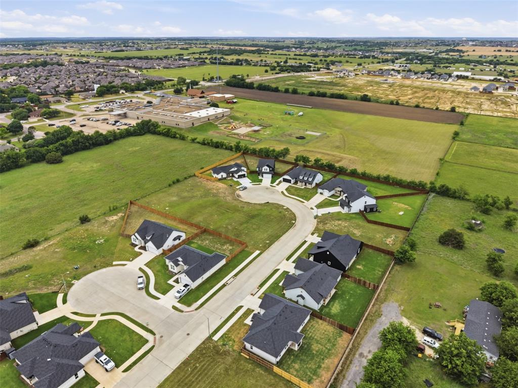 585 Highview Court Godley, TX 76044 - Photo 12 of 15 an aerial view of a house with a ocean view