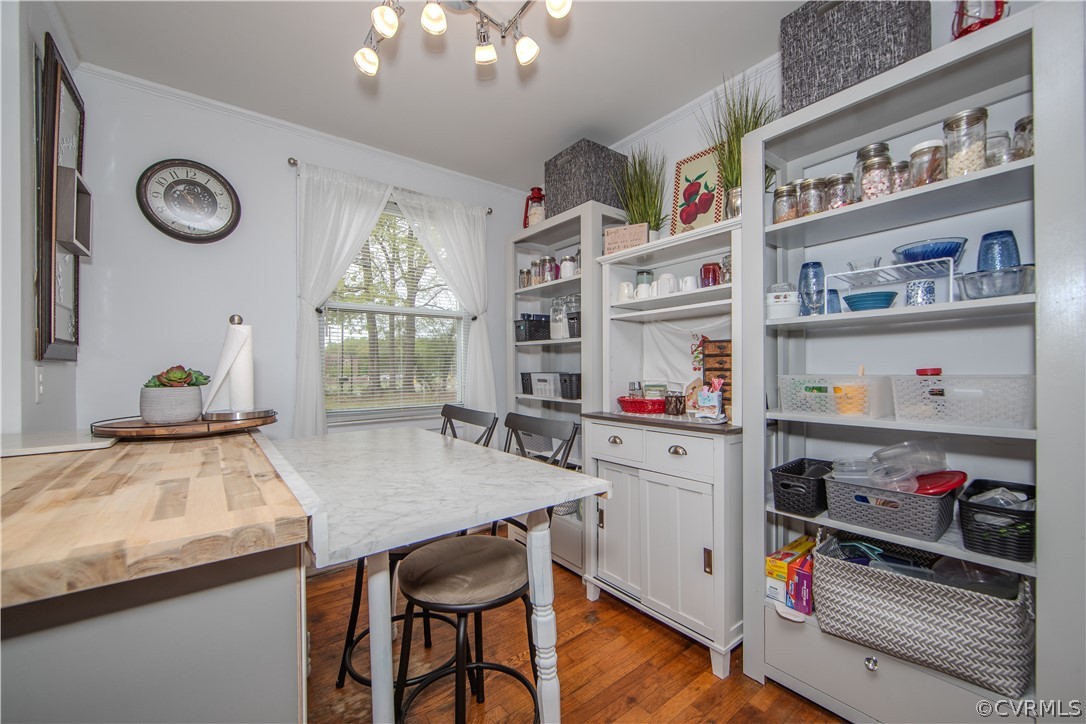 6736 Strathmore Road Richmond, VA 23237 - Photo 15 of 25 a open kitchen with a refrigerator and a stove top oven