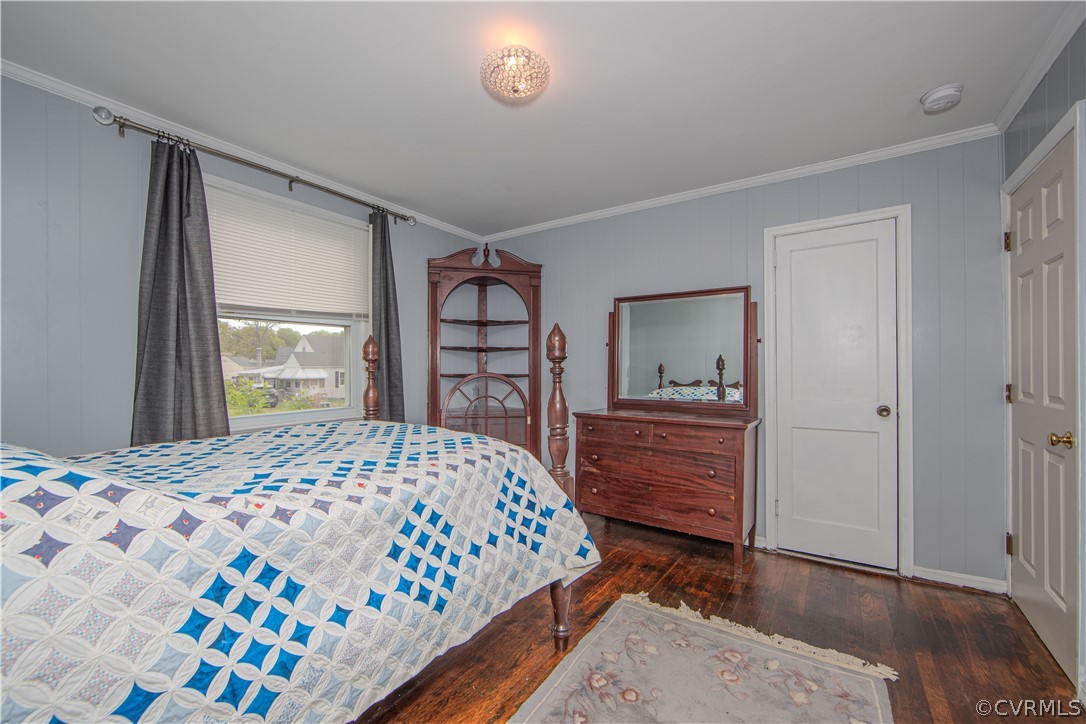 6736 Strathmore Road Richmond, VA 23237 - Photo 20 of 25 a bedroom with a bed and a dresser