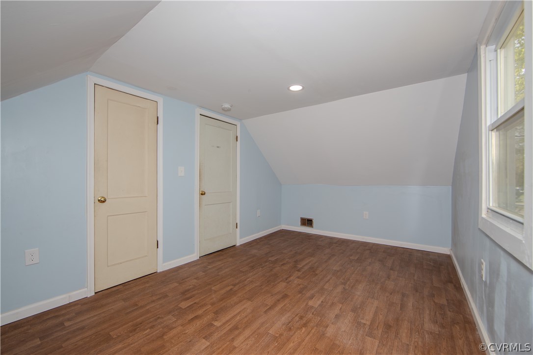 6736 Strathmore Road Richmond, VA 23237 - Photo 22 of 25 wooden floor in an empty room with a window