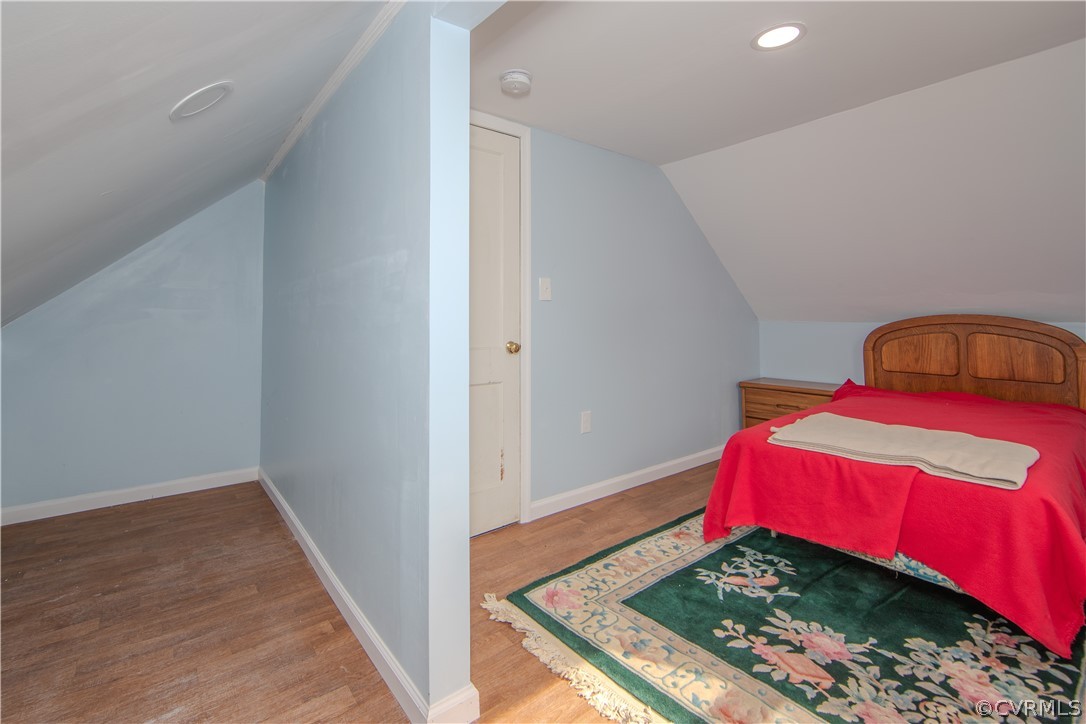 6736 Strathmore Road Richmond, VA 23237 - Photo 24 of 25 a bedroom with a bed and a window