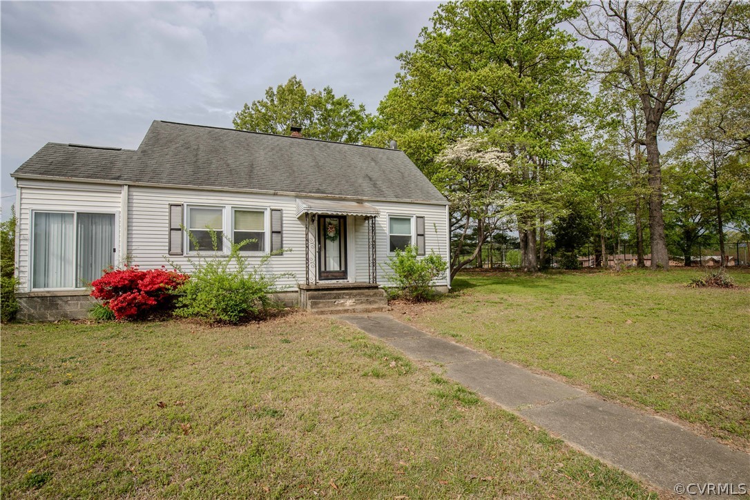 6736 Strathmore Road Richmond, VA 23237 - Photo 5 of 25 a house view with a garden space