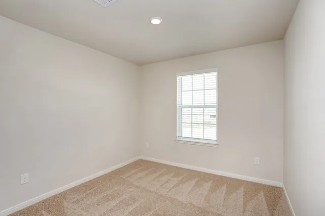 an empty room with window