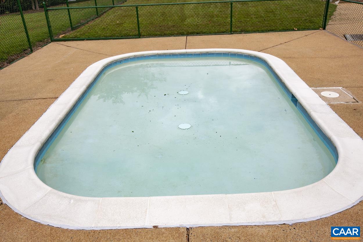 145 Georgetown Green Charlottesville, VA 22901 - Photo 37 of 43 a view of a swimming pool in a backyard