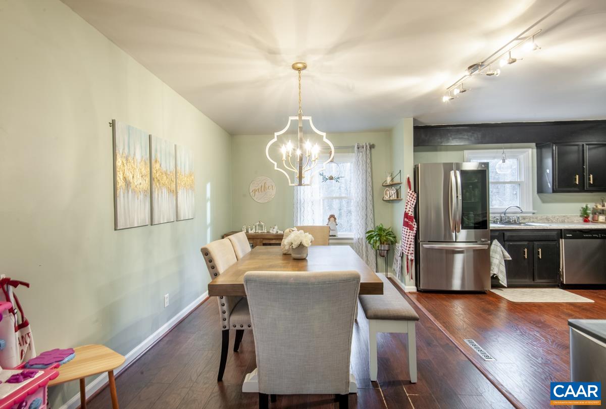 145 Georgetown Green Charlottesville, VA 22901 - Photo 6 of 43 a dining room with furniture and window
